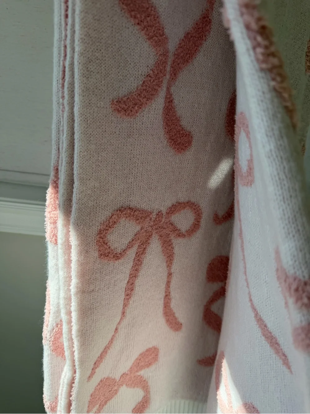 cupcakes & cashmere Pink Bow Motif Decorative Throw